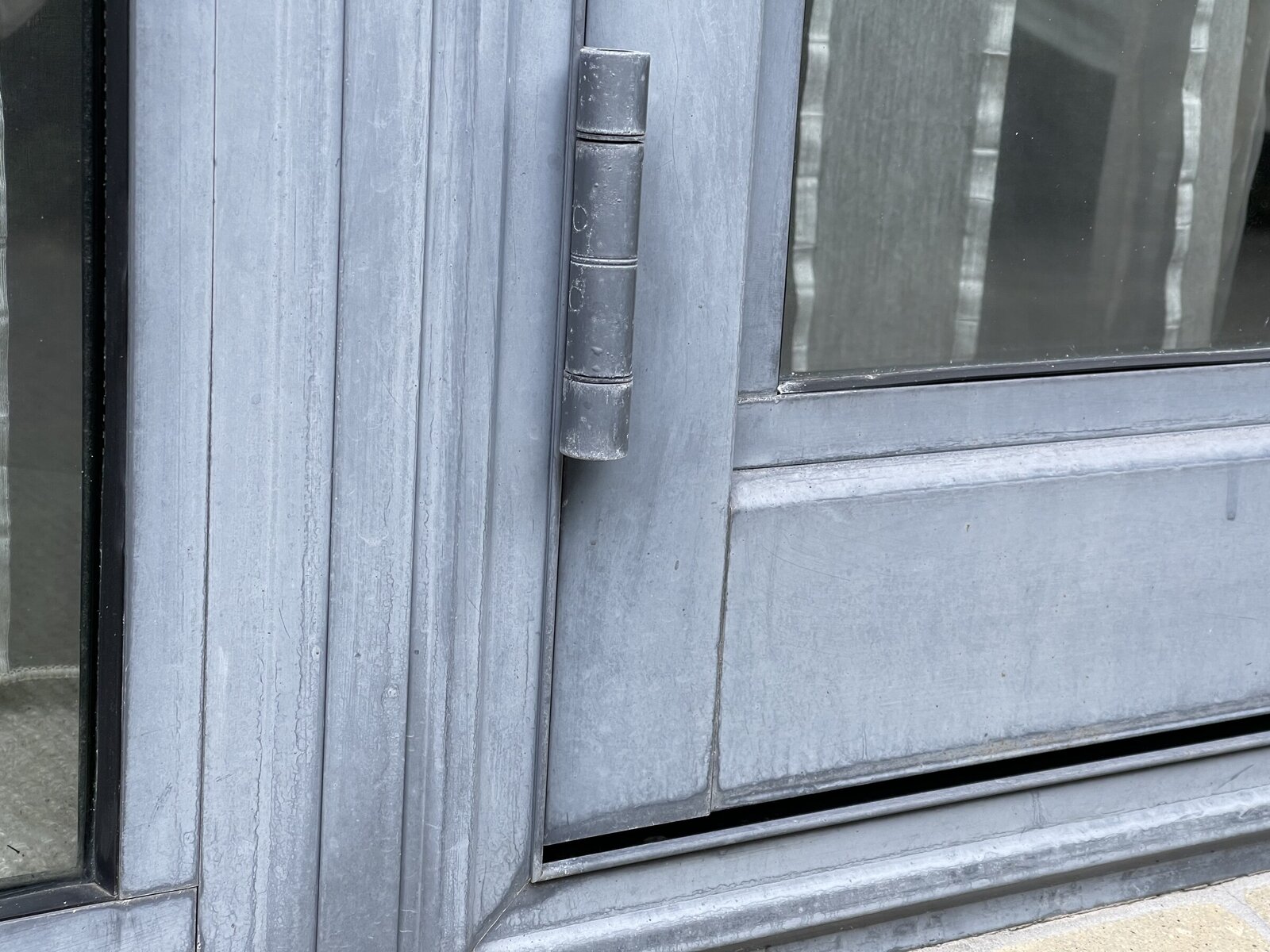 Aluminium joinery before Nano-Clear recolouring and rejuvenation